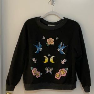 Wildfox sweatshirt with flowers, birds, moons etc.